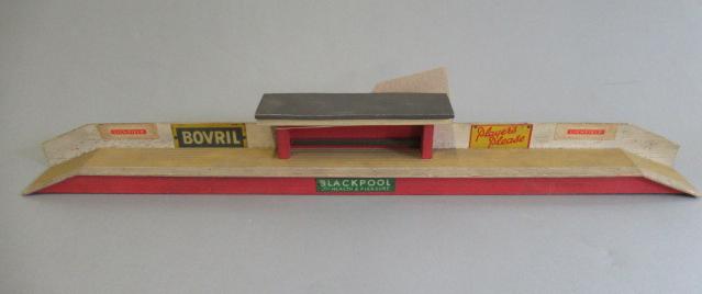 OO wooden station with platform and tin signs Image