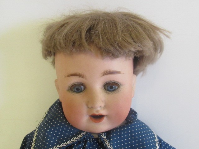 A Schützmeister & Quendt bisque socket head character doll Image