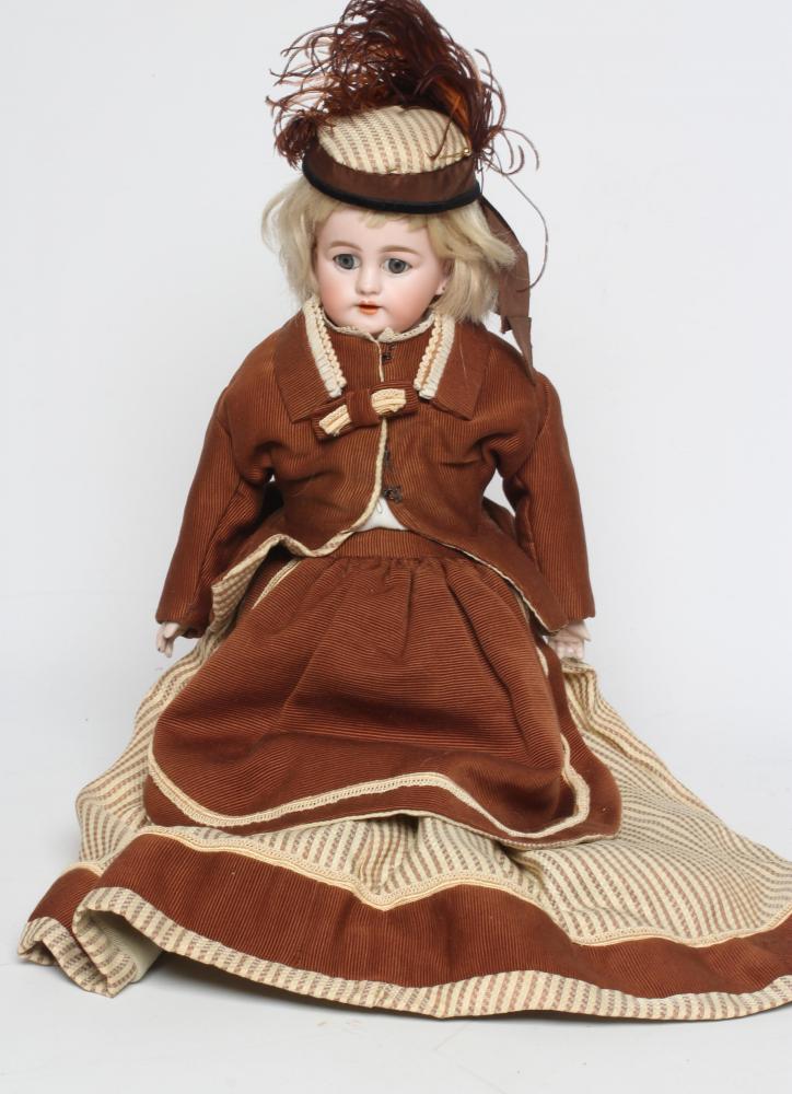 A bisque shoulder head doll Image
