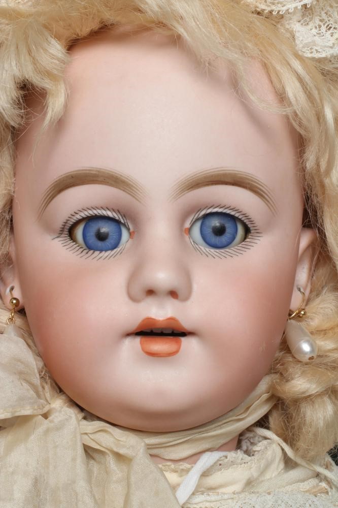 A Simon & Halbig bisque socket head doll Image