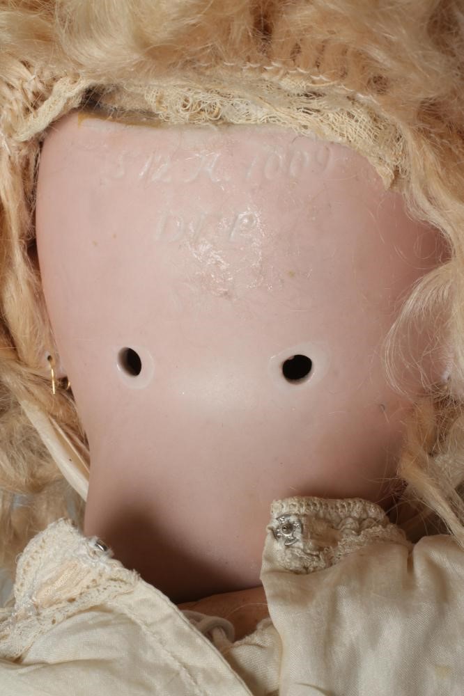 A Simon & Halbig bisque socket head doll Image