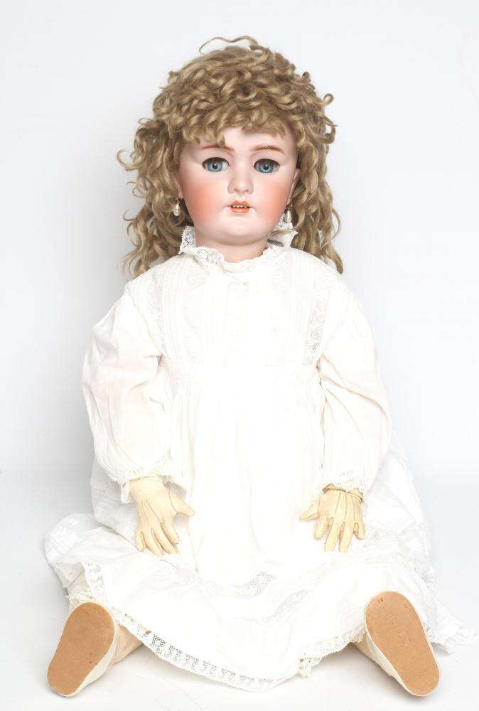 A large German bisque socket head doll Image