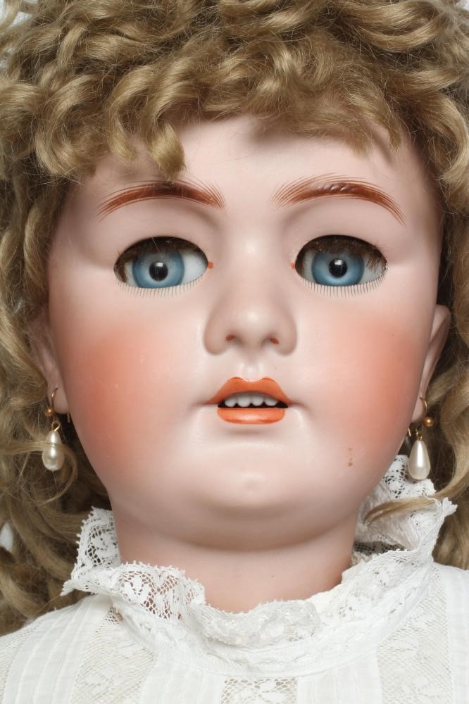 A large German bisque socket head doll Image