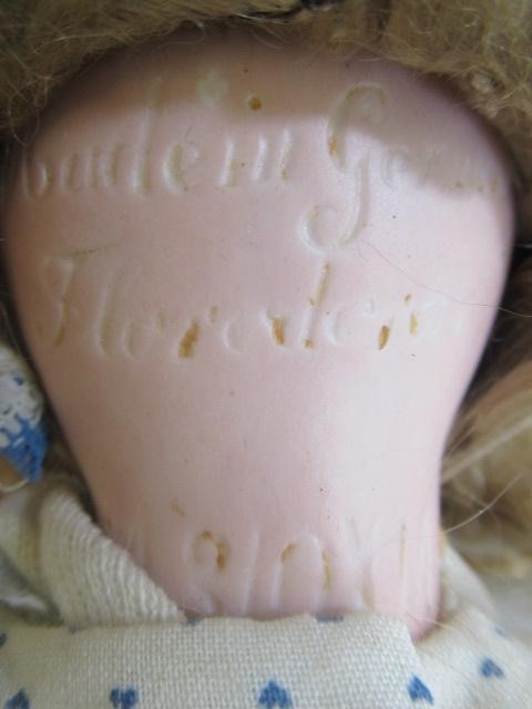 An Armand Marseille "Florodora" bisque socket head doll Image