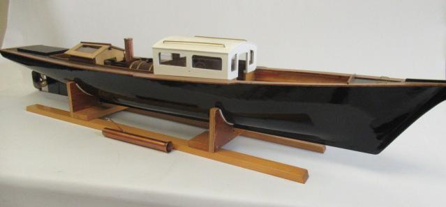 A radio controlled steam launch fitted with twin cylinder reversing steam engine and gas fired Image