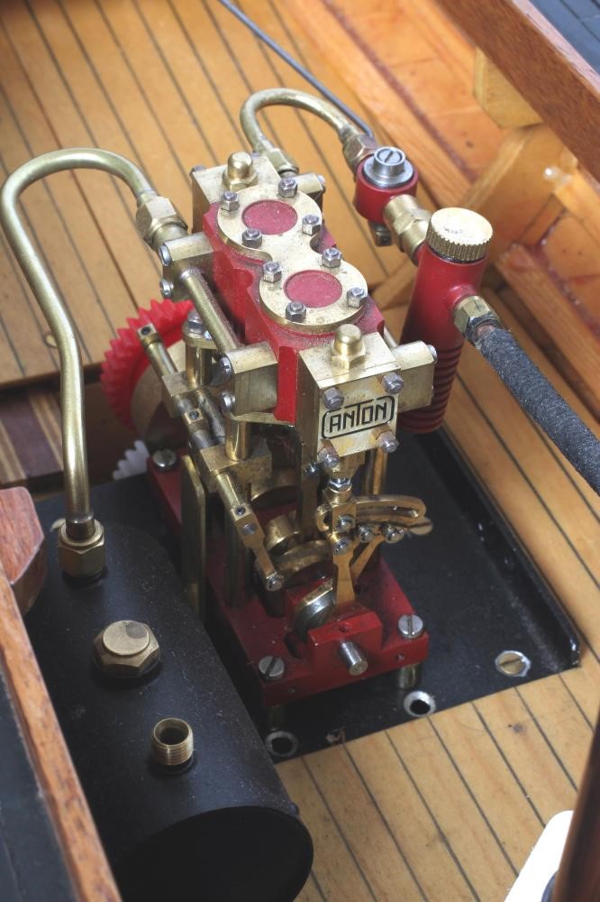 A radio controlled steam launch fitted with twin cylinder reversing steam engine and gas fired Image