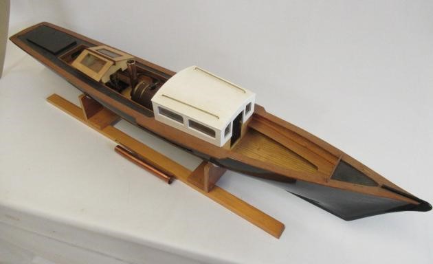 A radio controlled steam launch fitted with twin cylinder reversing steam engine and gas fired Image