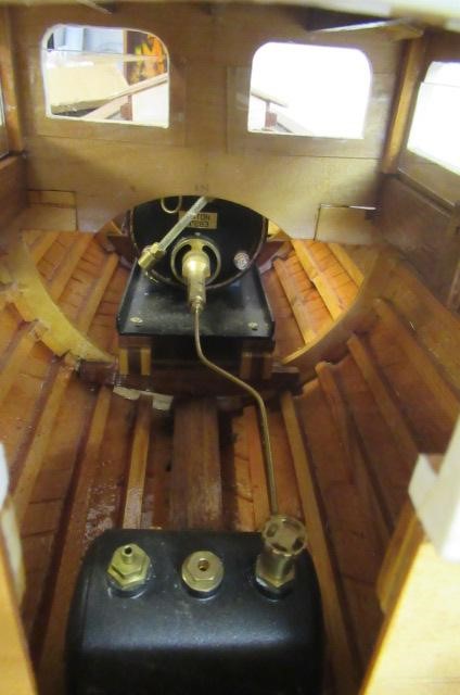 A radio controlled steam launch fitted with twin cylinder reversing steam engine and gas fired Image