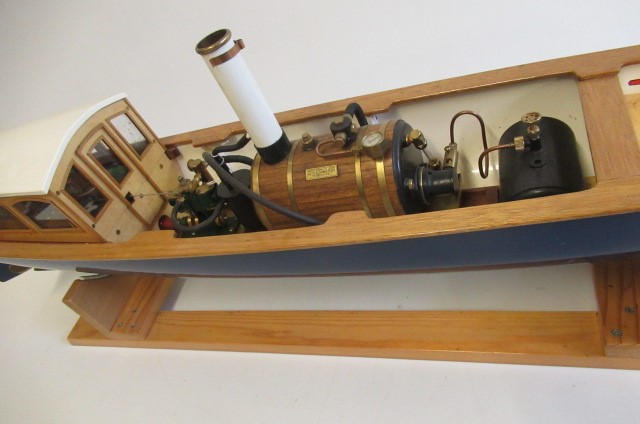 A radio controlled steam launch fitted with non-reversing twin cylinder steam engine and gas boiler Image