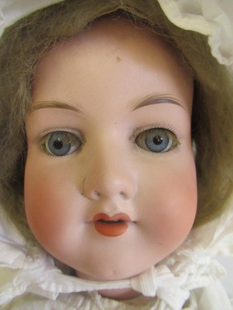 An Armand Marseille bisque socket head doll Image