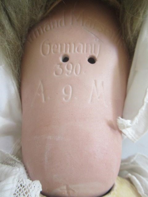 An Armand Marseille bisque socket head doll Image