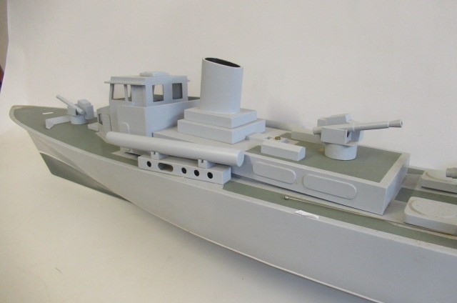 A radio controlled motor torpedo boat of wooden construction with two electric motors and R.C. Image