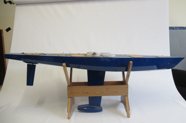 A large radio controlled pond yacht fitted with R.C. equipment and sails Image