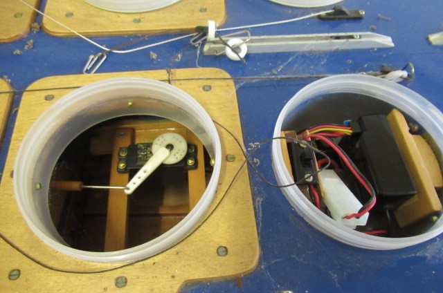 A large radio controlled pond yacht fitted with R.C. equipment and sails Image