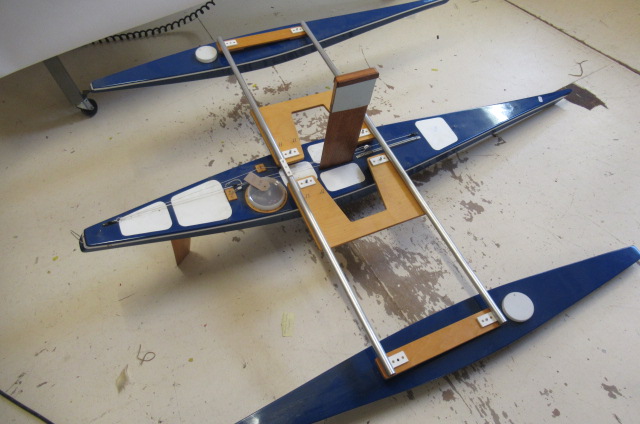 A large radio controlled catamaran fitted with radio control equipment and sails Image