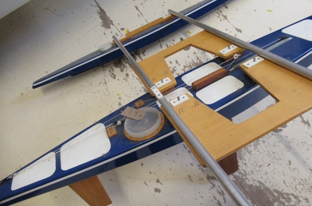 A large radio controlled catamaran fitted with radio control equipment and sails Image
