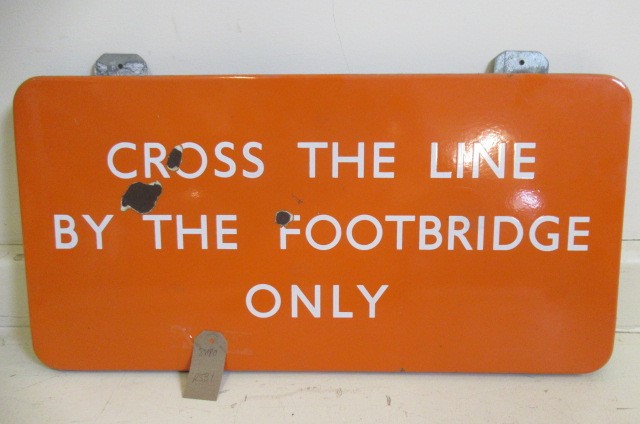 B.R. "N.E." enamel sign "Cross the line by the Footbridge only" finished in orange with white Image