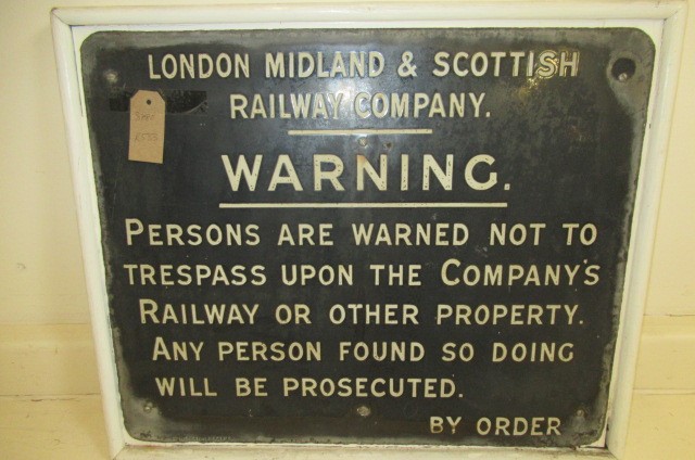 A London Midland and Scottish Railway enamel Trespass warning notice white letters on black Image
