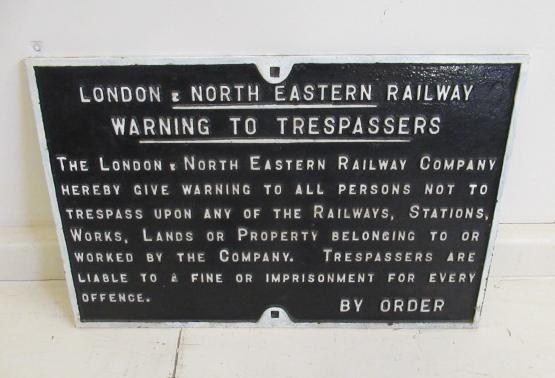 A cast iron London Midland and Scottish Railways Trespass Notice Image