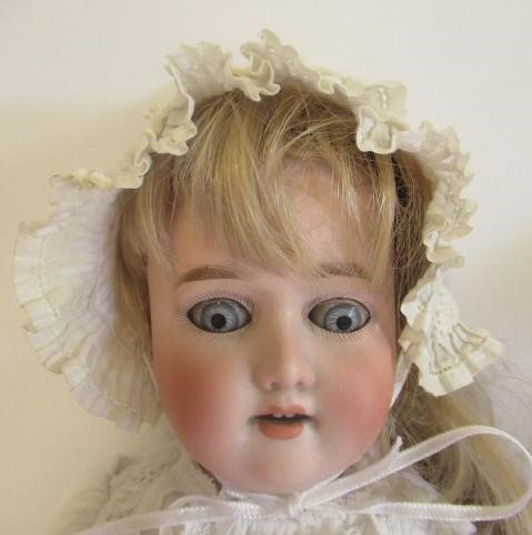 A Simon & Halbig bisque socket head doll Image