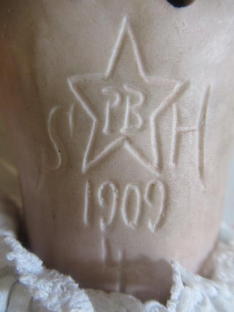 A Simon & Halbig bisque socket head doll Image