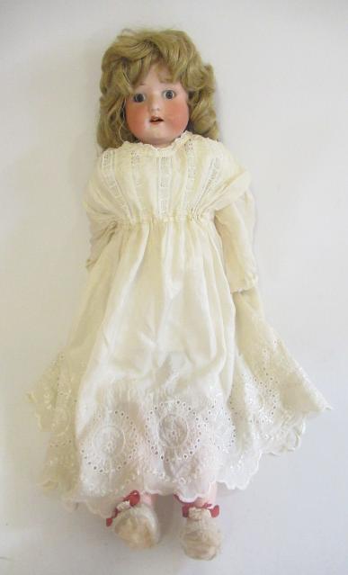 A Heubach bisque shoulder head doll Image