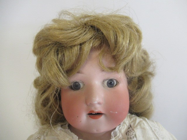 A Heubach bisque shoulder head doll Image
