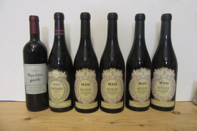 Four bottles 2002 Masi Rocioto della Valpollicella Image