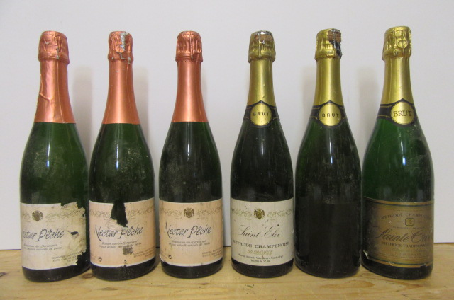 Three bottles Nectar Peche sparkling Image