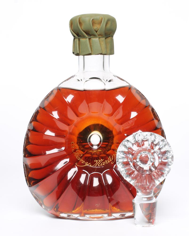 One bottle Remy Martin Cognac in decorated Centaure Baccarat Cristal Decanter and two stoppers Image
