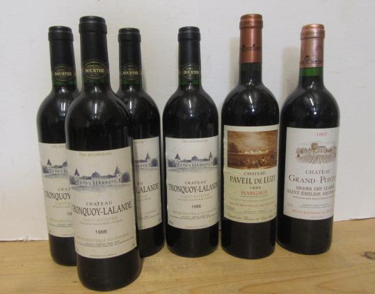 Four bottles 1998 Chateau Tronqury-Lalande Saint Estephe Image