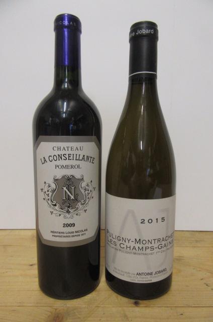 One bottle 2009 Chateau La Conseillante Pomerol and one bottle 2015 Puligny-Montrachet Les Image