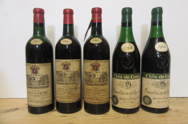 Three bottles 1961 Chateau Saint-Estephe and two bottles 1964 Clos de Conte Image
