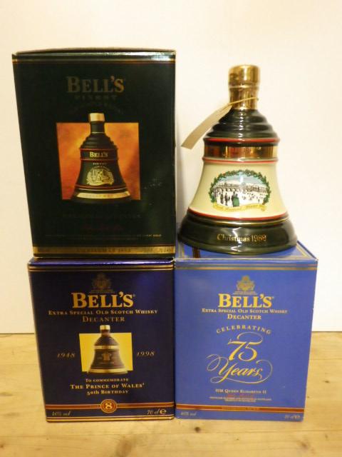 Four commemorative Bell's decanters Christmas 1989 Image