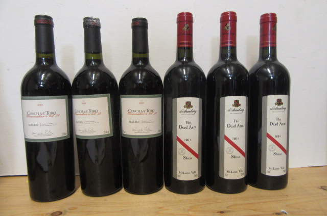 Three bottles 2001 Concha Y Toro Malbec and three bottles 2003 The Dead Arm Shiraz Image