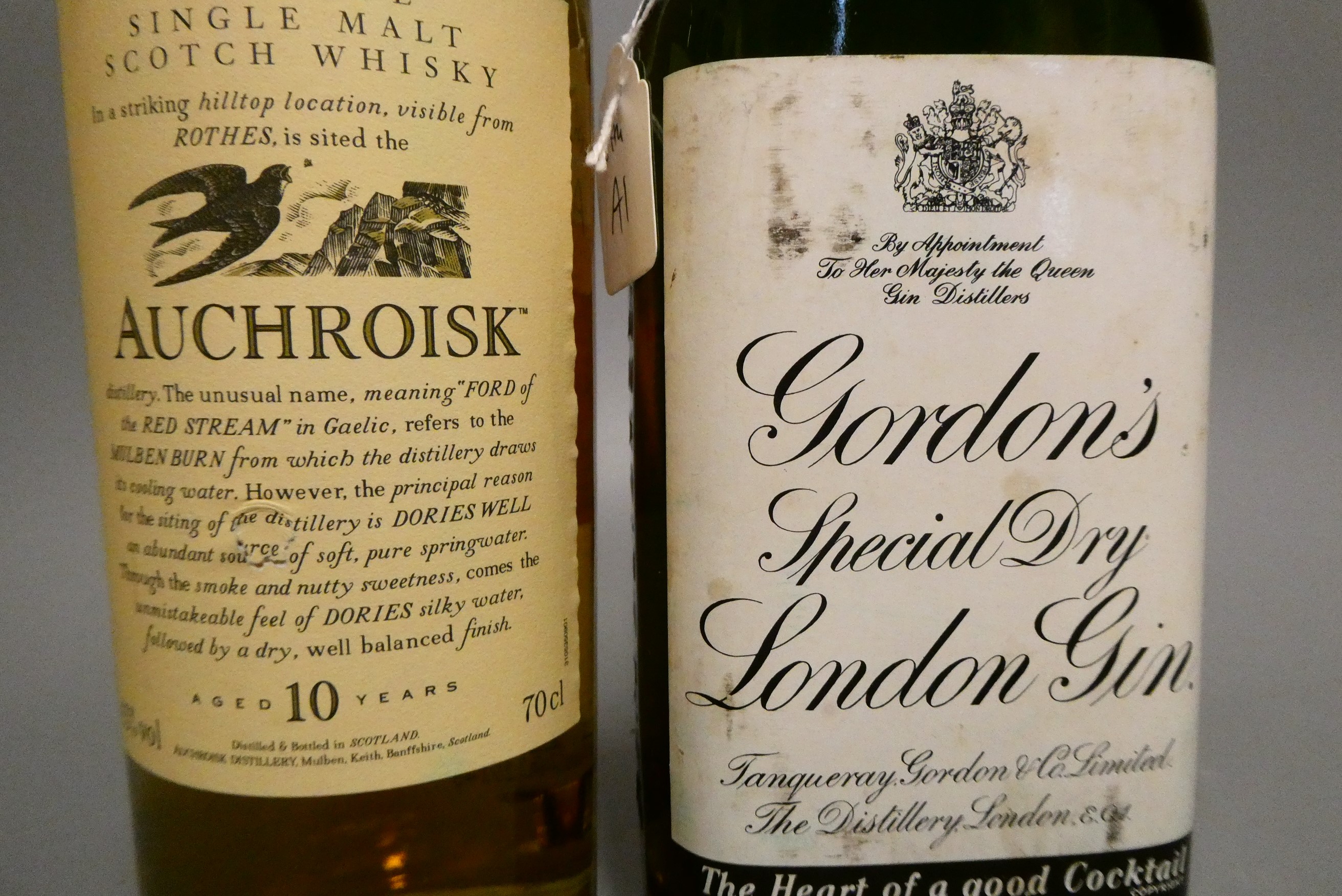 Two bottled spirits, comprising one 70cl Auchroisk 10yr old Speyside single malt whisky, 43%, and a Image