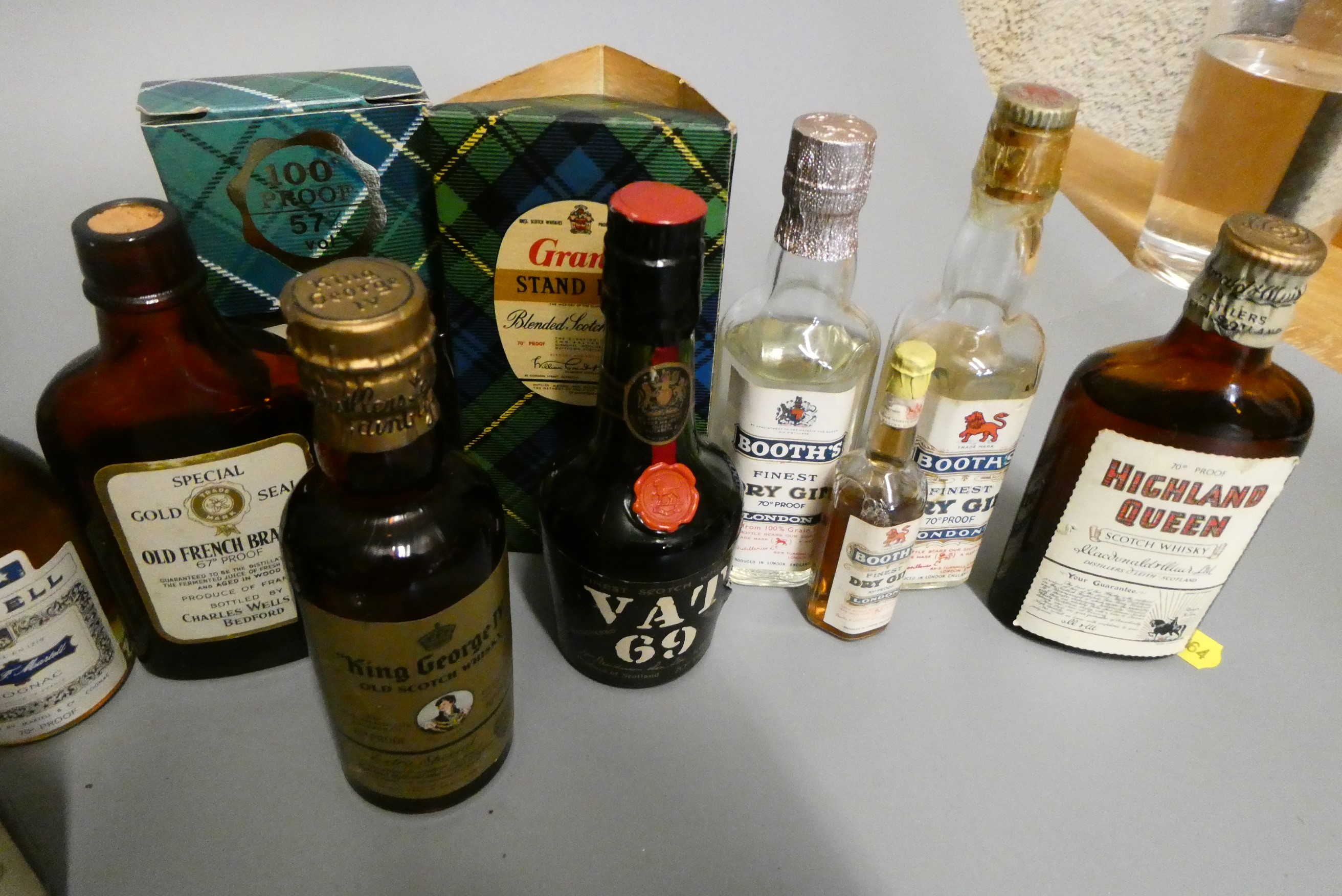 A large quantity of miniatures, including 18 whisky, 4 gin, Martell cognac, sherry and others (Est. Image
