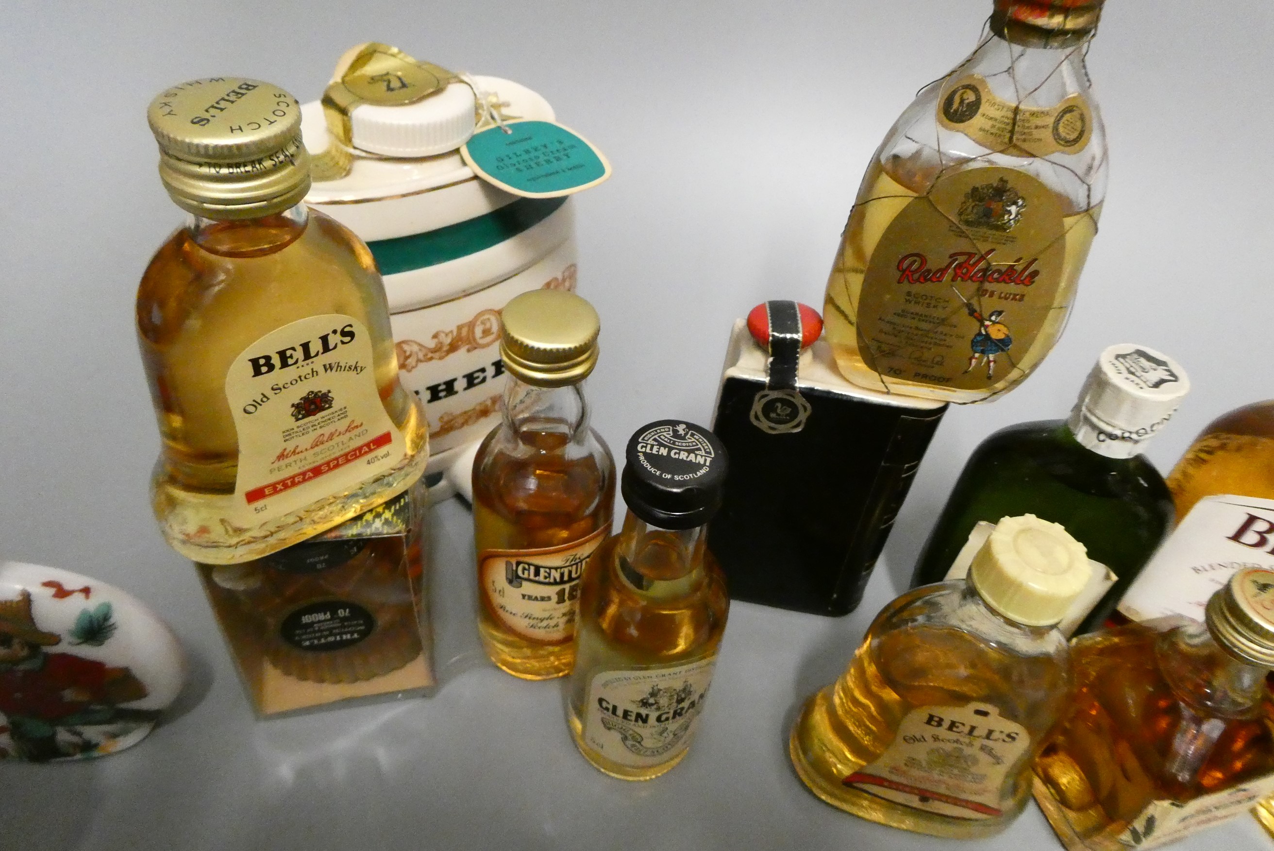 A large quantity of miniatures, including 18 whisky, 4 gin, Martell cognac, sherry and others (Est. Image
