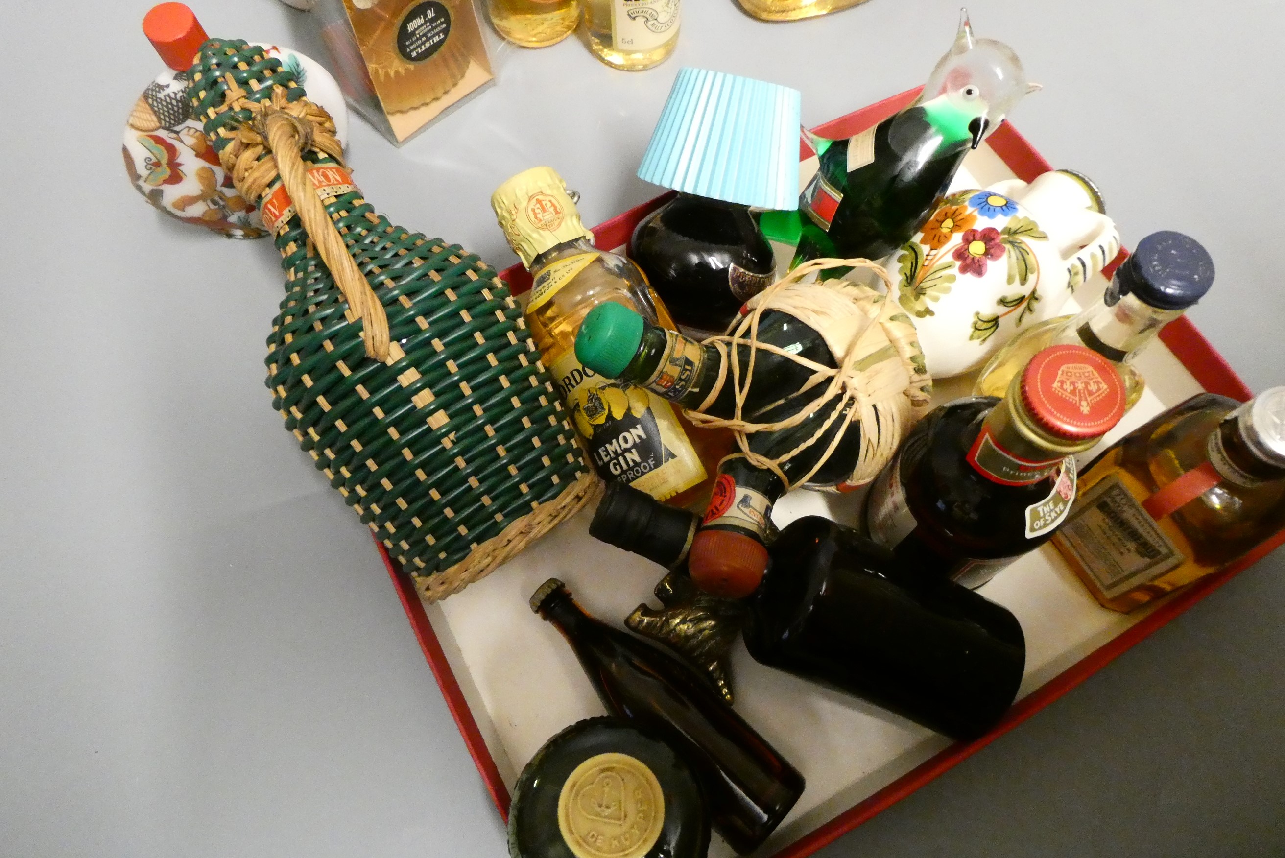 A large quantity of miniatures, including 18 whisky, 4 gin, Martell cognac, sherry and others (Est. Image