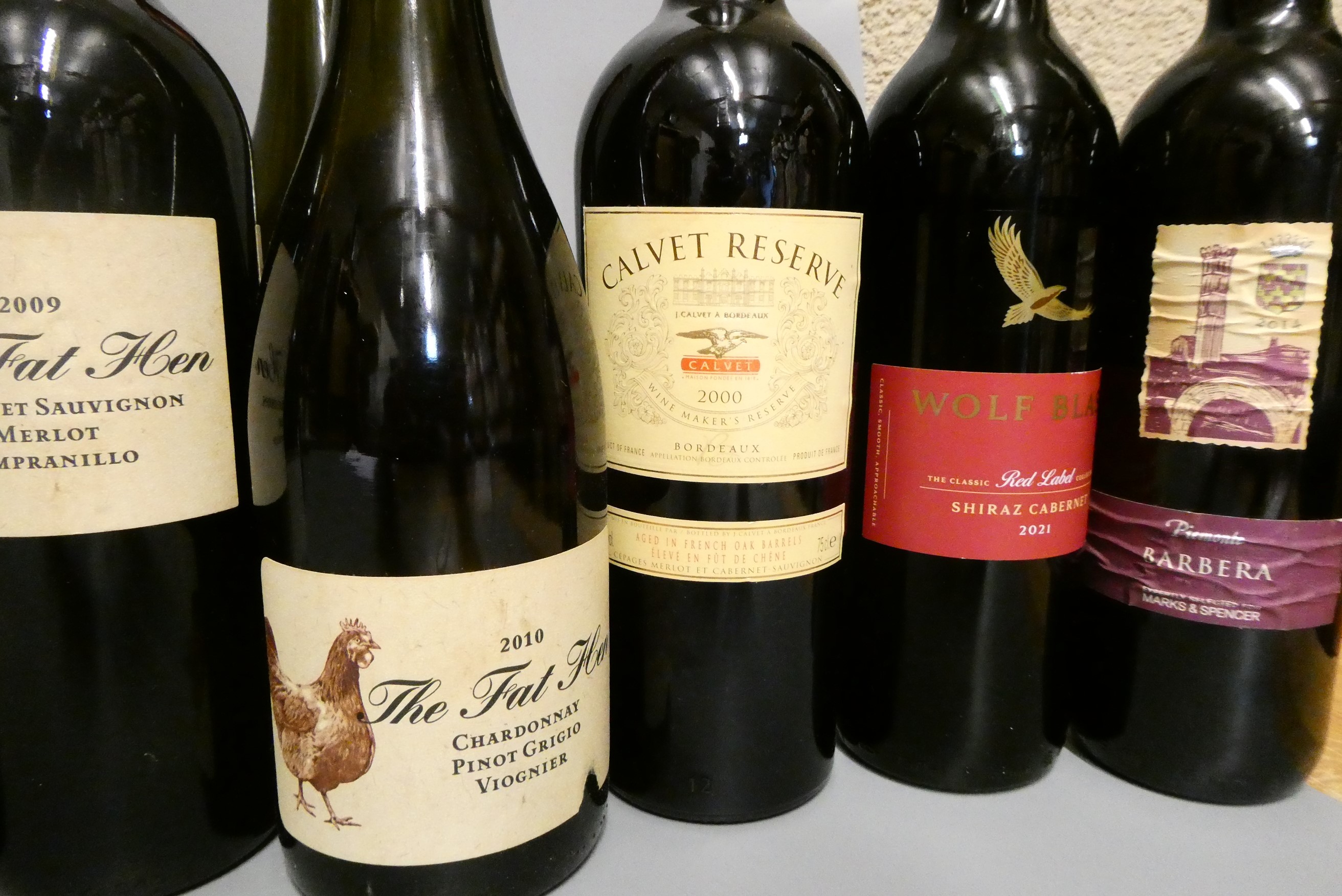 Fifteen bottles of mixed wine Image