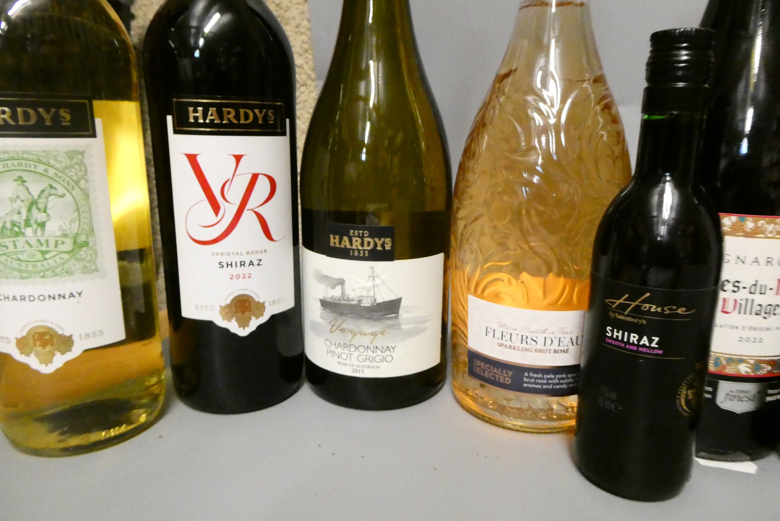 Fifteen bottles of mixed wine Image