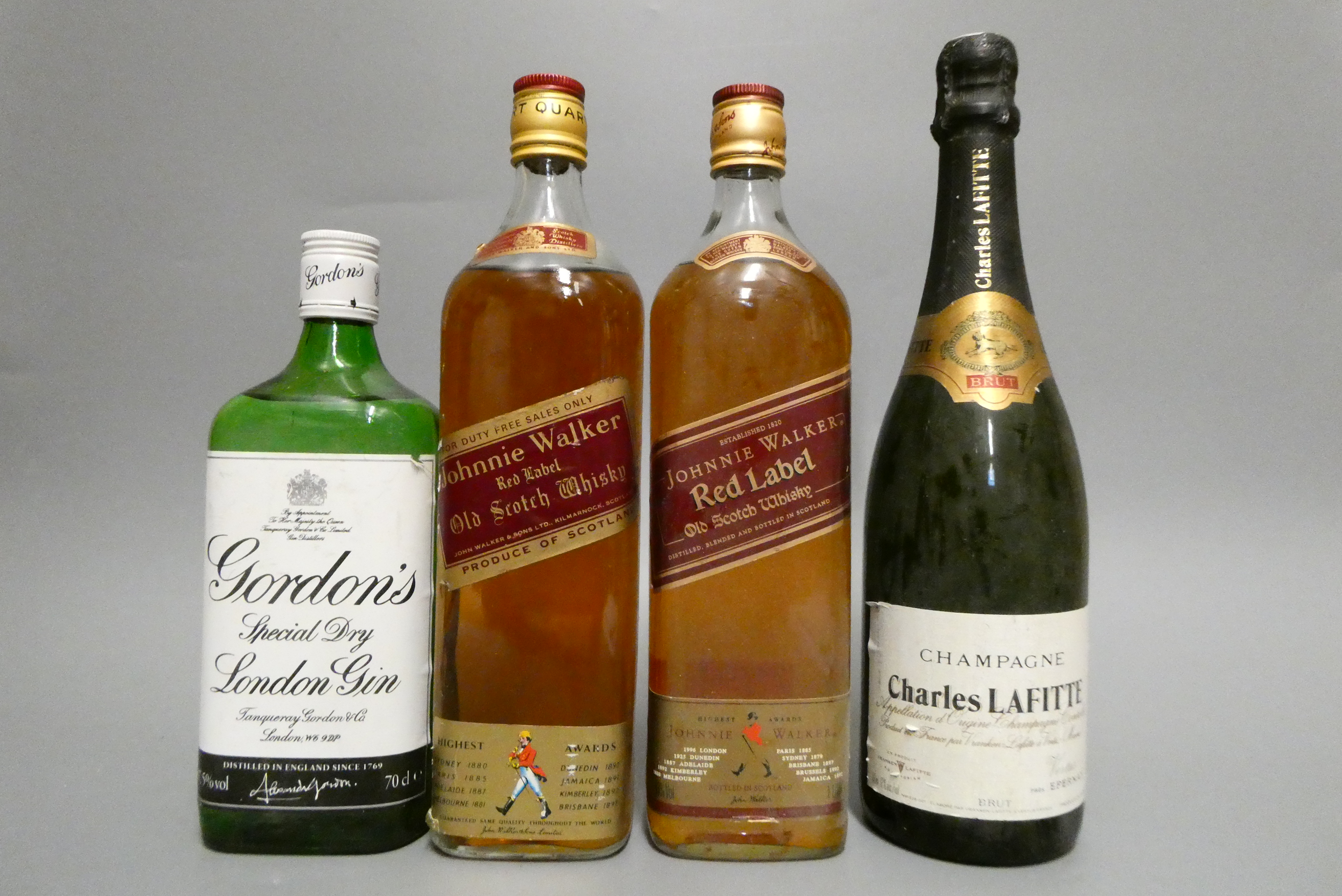 Four mixed bottles Image