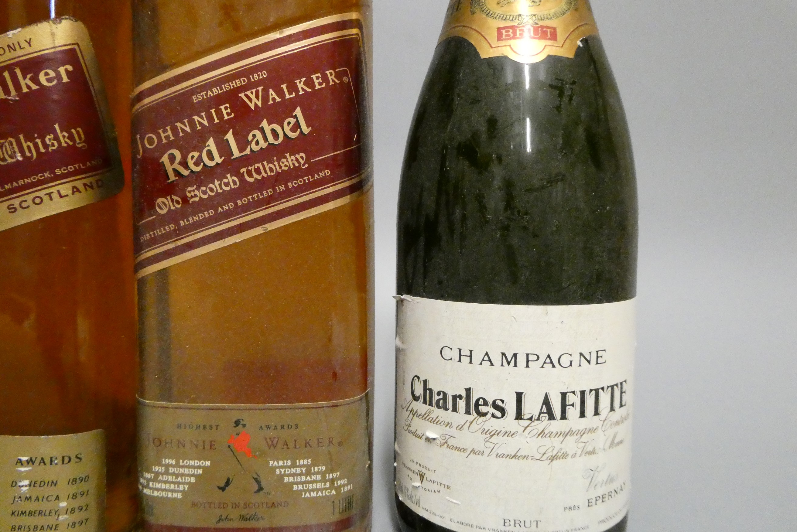 Four mixed bottles Image