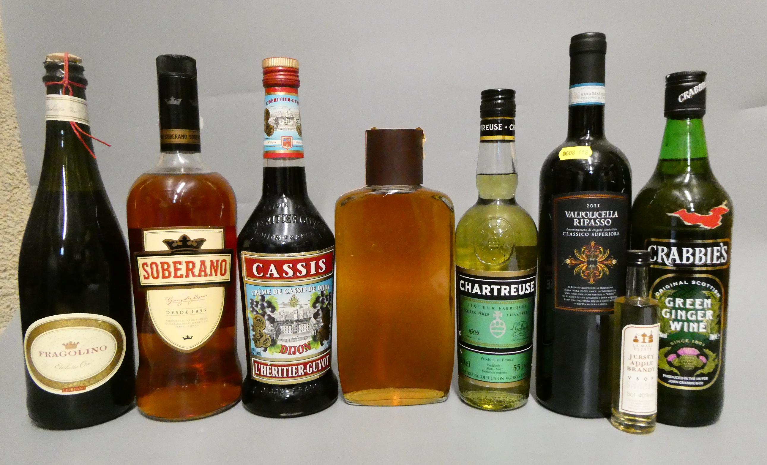 Seven bottles of mixed alcohol Image