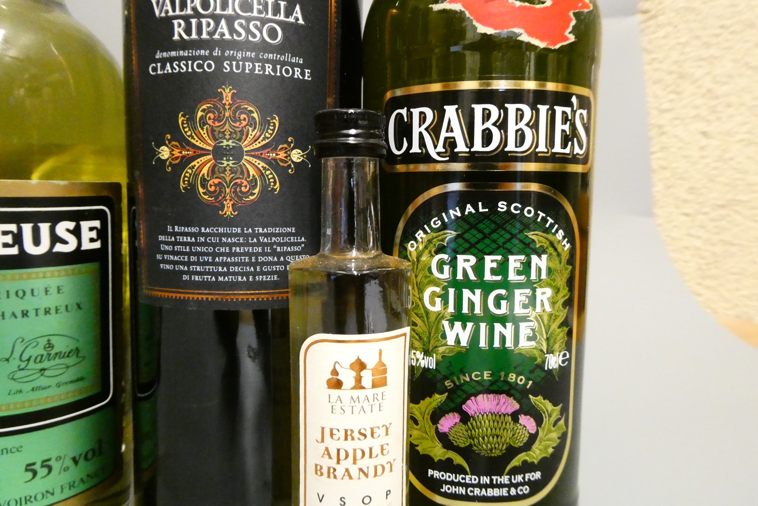 Seven bottles of mixed alcohol Image