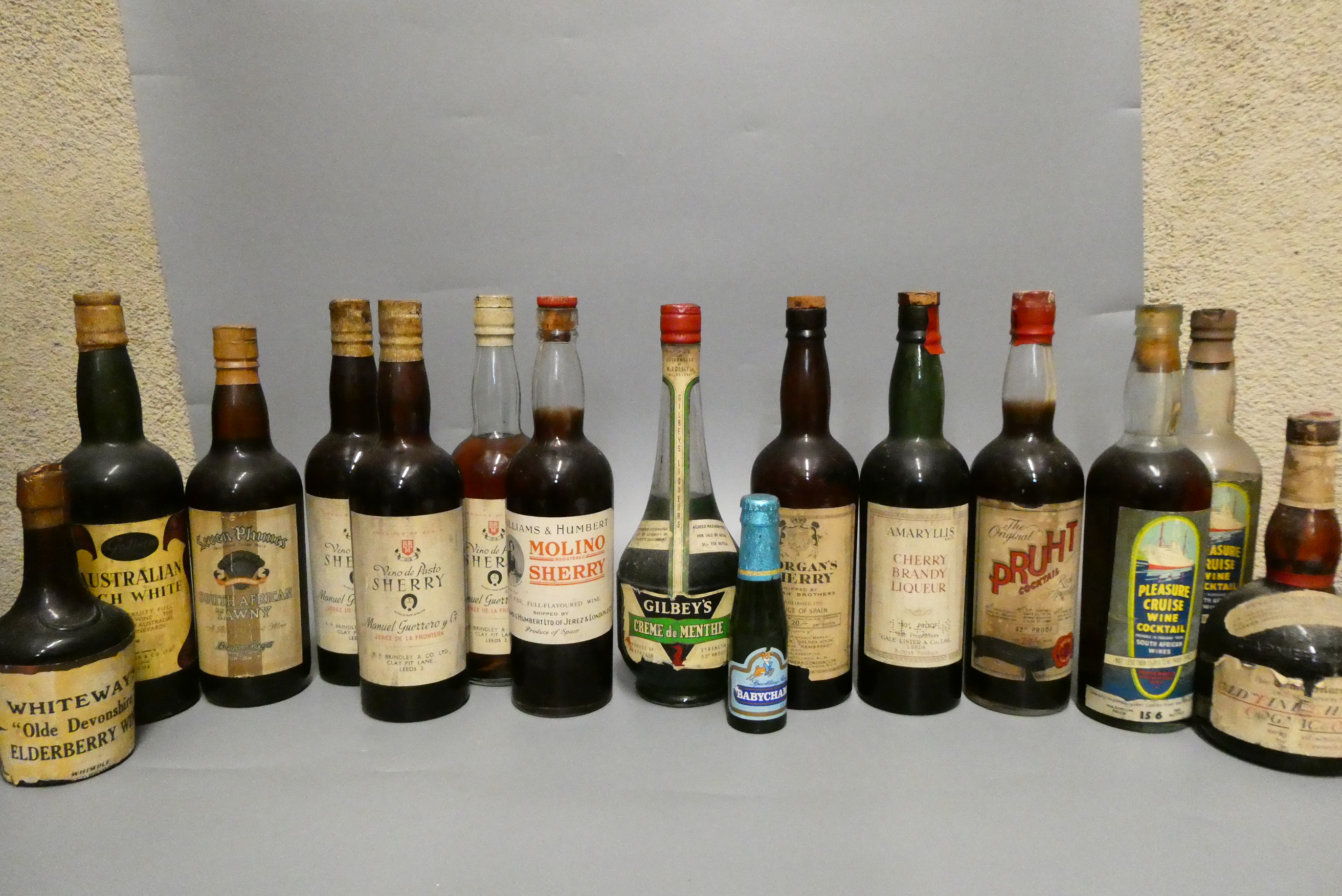 Twenty one bottles of mixed liqueur and sparkling wine Image