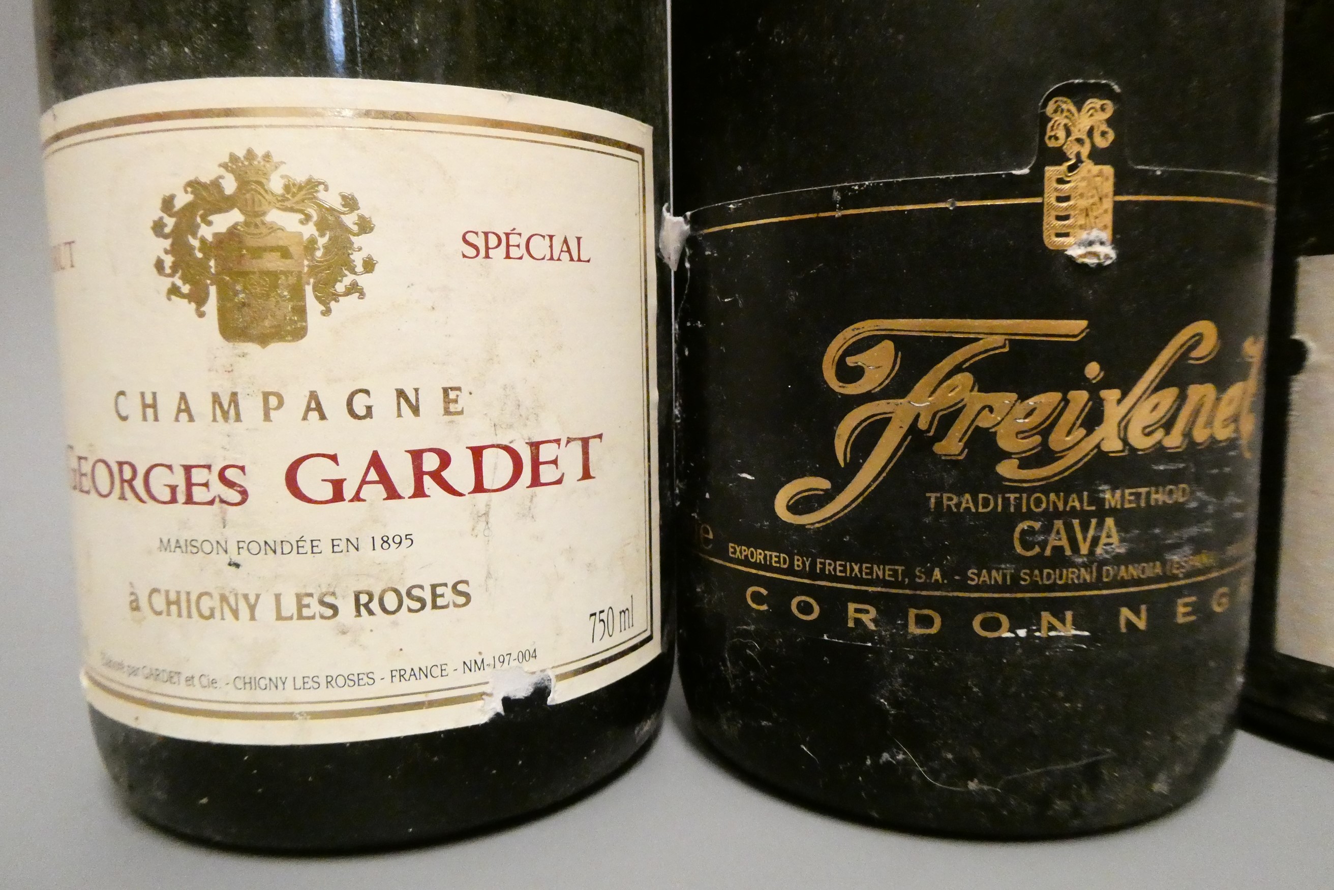 Twenty one bottles of mixed liqueur and sparkling wine Image