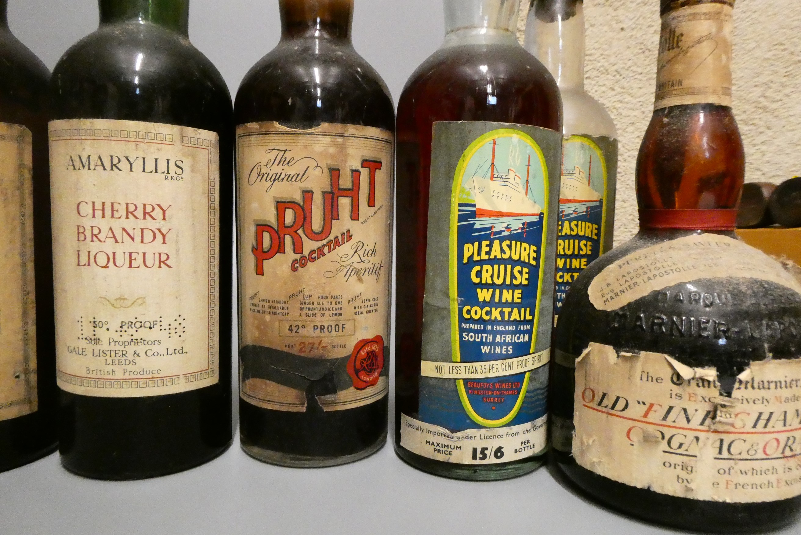 Twenty one bottles of mixed liqueur and sparkling wine Image