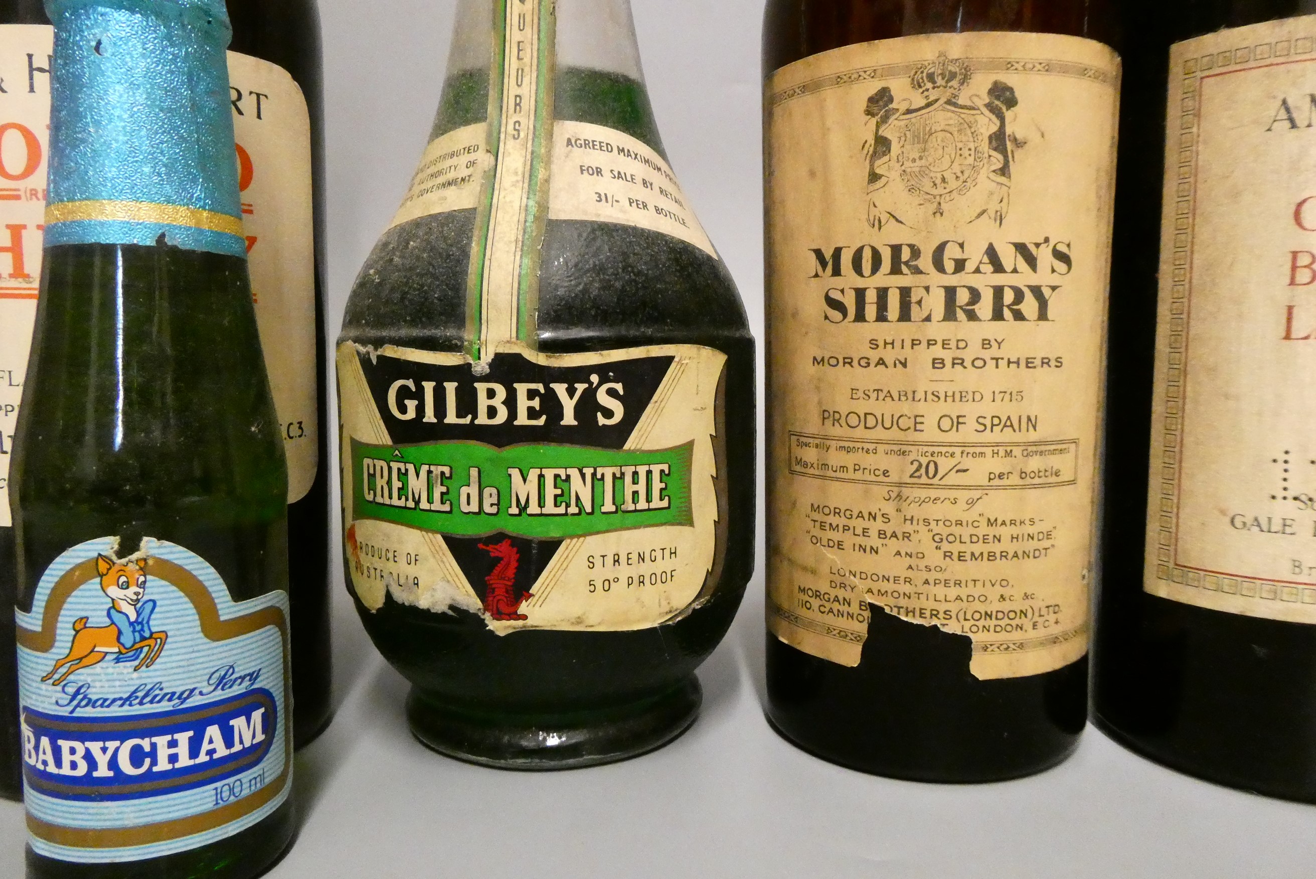 Twenty one bottles of mixed liqueur and sparkling wine Image