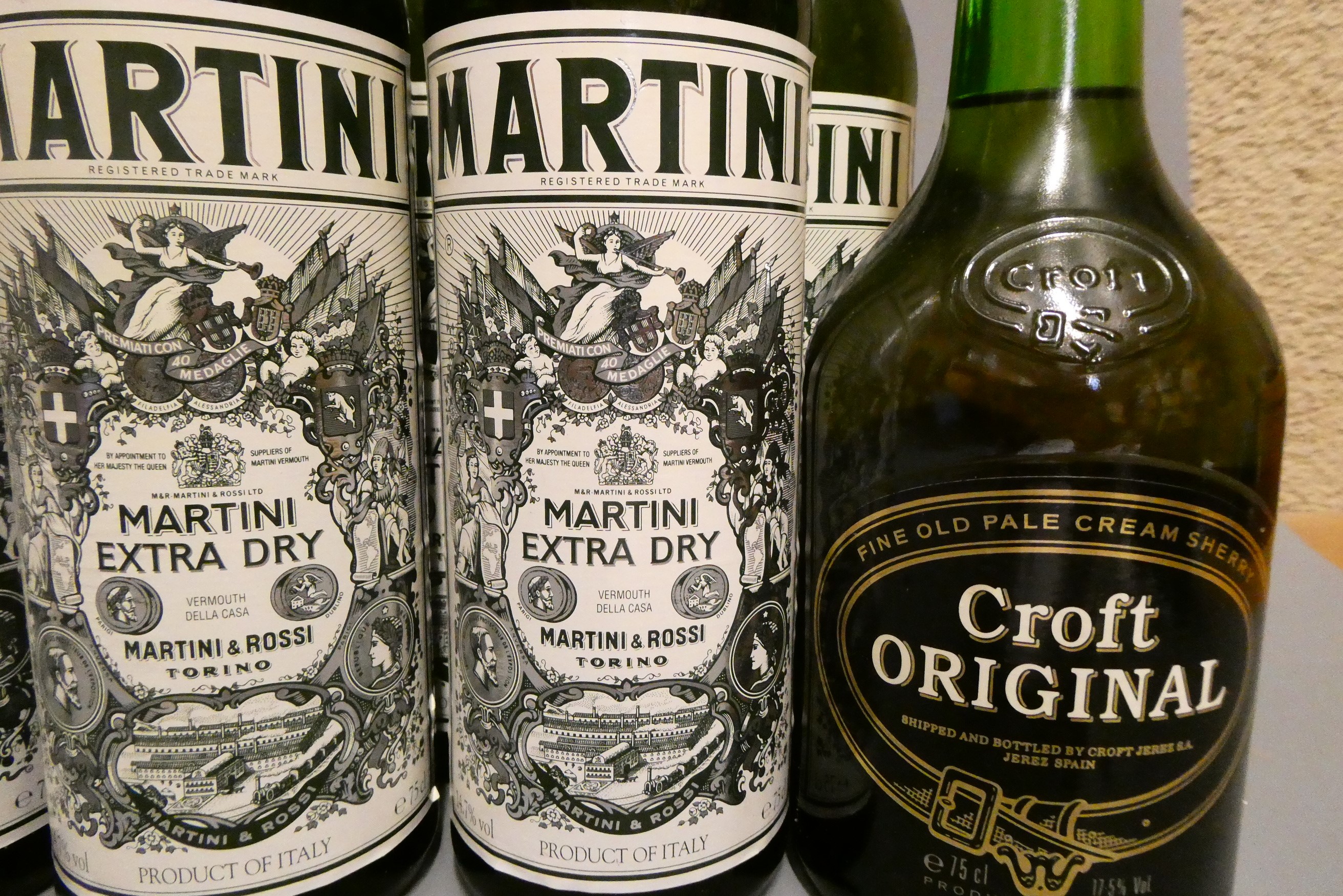 Thirteen bottles comprising four 150cl Martini, seven 75cl Martini Extra Dry, one 75cl Harvey's Image
